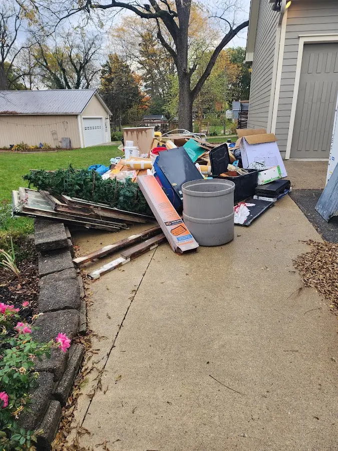 Dumpster being loaded with debris for 30 Yard Dumpster Rental in Southampton